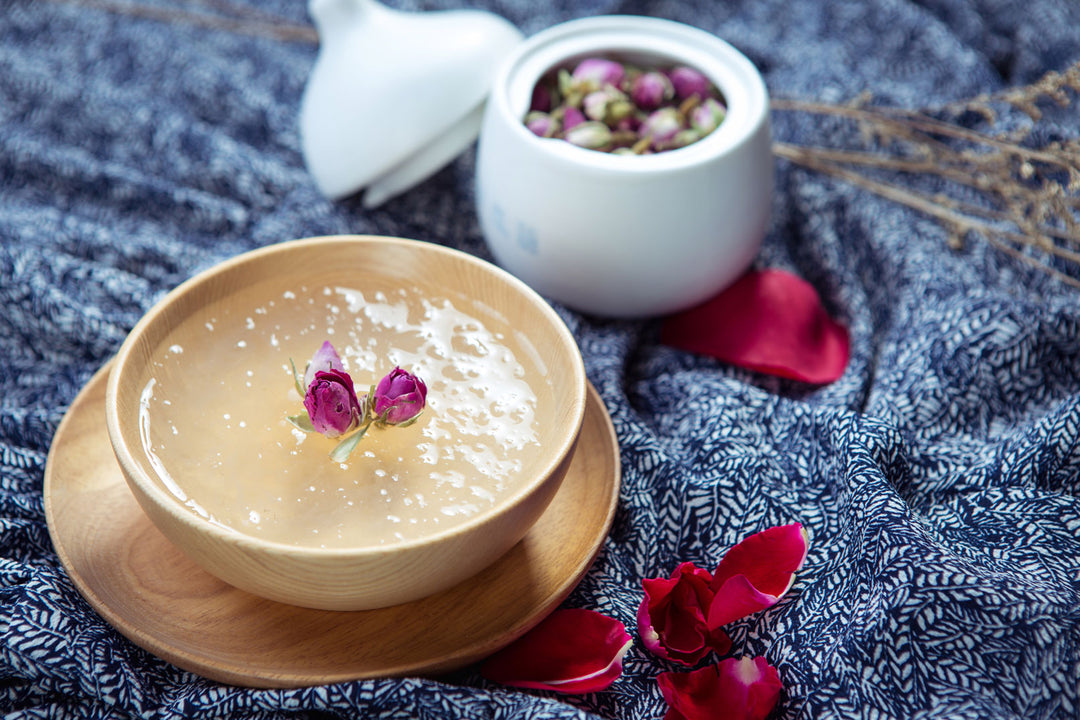 Image of cooked edible birds nest soup in a bowl with small flowers